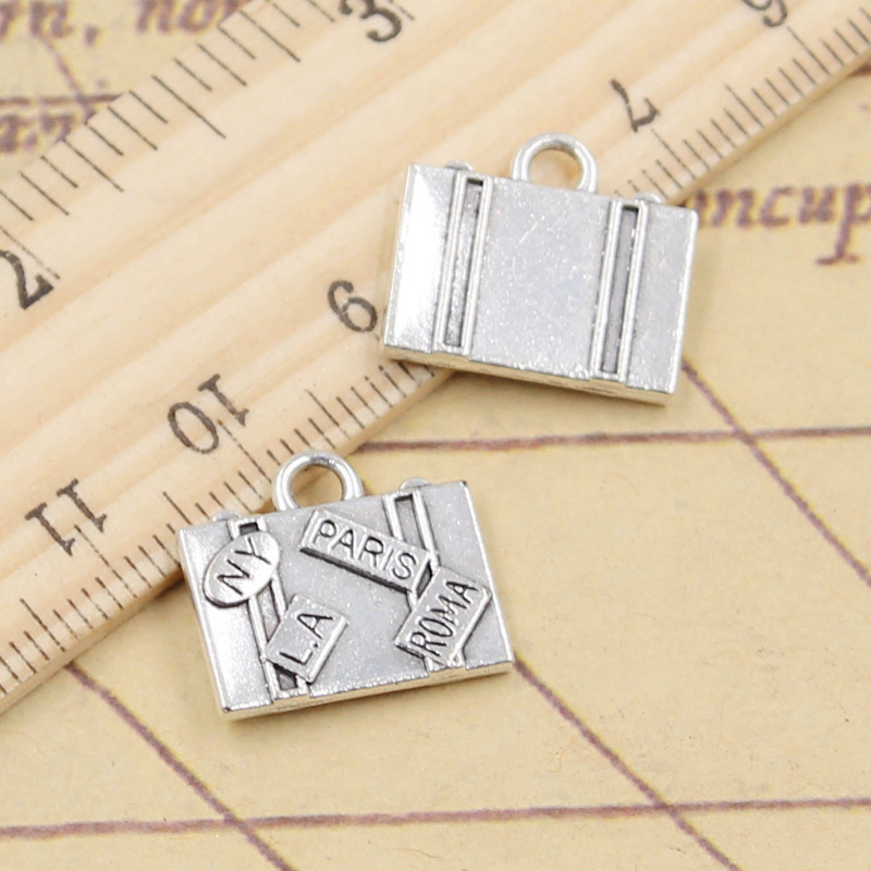 10 pçs encantos sacos de viage - Jewelry Making York avaliação e preço